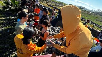 ILWU Local 142 Maui Division members participate in a mālama ʻāina work day restoring the historic Waiheʻe fishpond and wetlands.